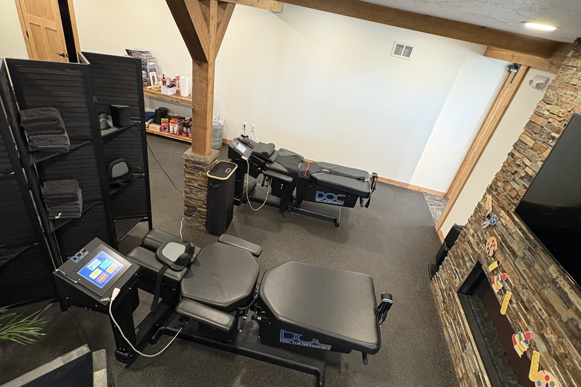 Decompression suite with stone fireplace at True North Chiropractic